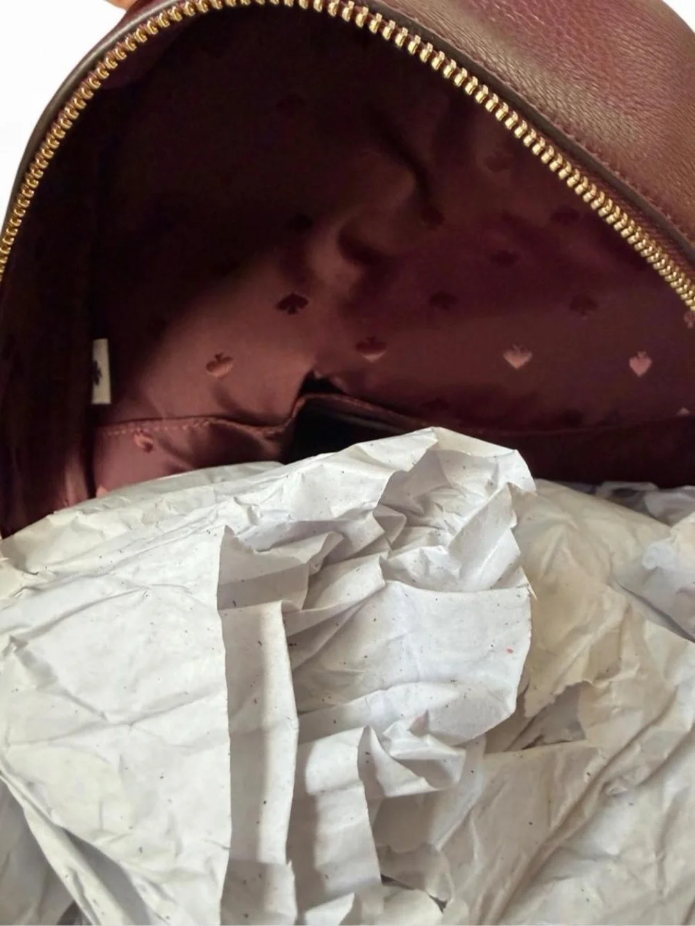 kate spade Pebbled Leather Backpack in Burgundy